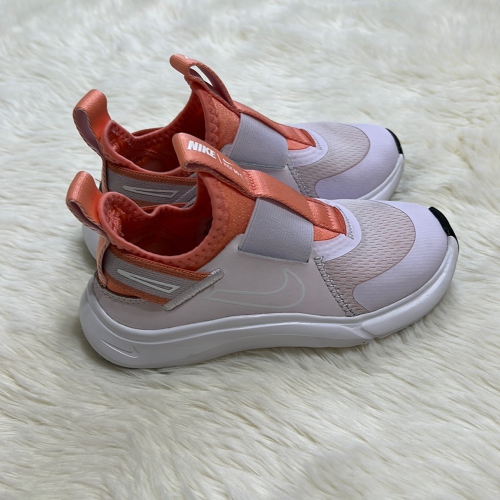 Nikes girls tennis shoes size 10.5